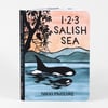 A board book titled "1•2•3 SALISH SEA" by Nikki McClure with a cover illustration of an orca in blue water, a tree silhouette, and the author's name on the spine and front cover.