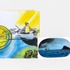 A hardcover book with a colorful illustrated cover showing a person in a small boat on the water, with bold yellow, blue, and black artwork and a smaller matching illustrated card or insert beside it.