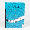 A hardcover journal with a bright blue illustrated cover showing two hands clasping, diagonal black rain-like lines with small pink petals, the title "RALLY," and the text "A Nikki McClure Journal."