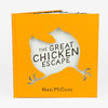 An orange hardcover book with a die-cut chicken-shaped opening on the cover, the title "THE GREAT CHICKEN ESCAPE," and the author name "Nikki McClure."