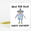 A folded birthday greeting card with a cartoon robot and the text "Beep Bop Boop" above "Happy Birthday".