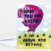 A greeting card with a pink-and-blue hot air balloon design and the text "THANK YOU FOR GOING above and BEYOND," plus small clouds, trees, and sheep illustrations.