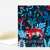 A folded greeting card with a colorful tiger in a leafy jungle scene and the text "GO GET 'EM TIGER" on the front.