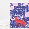 A folded greeting card with a dark purple floral design, a red fox illustration, and the words “Sending Love” in white script on the front.