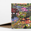 A folded greeting card featuring a colorful illustrated neighborhood scene with houses, cars, people, trees, and a pink ice cream truck.