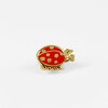 A small enamel pin shaped like a red ladybug with gold outline, spots, legs, and antennae.