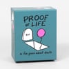 A teal game box labeled "PROOF OF LIFE" with a simple drawing of a tombstone marked "RIP," a pink balloon, and a coffin, plus the text "a fun game about death."