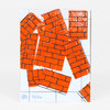 An abstract print featuring overlapping orange brick-patterned rectangles outlined in black, with a blue signature and the number "57/100" at the bottom.