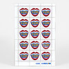 A sheet of decorative stamps shows fifteen red lips with blue centers and the words "I'M VOTING" in yellow, with "LISA CONGDON" printed at the bottom.