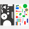 A stamp set with two printed sheets showing assorted geometric shapes and patterns, including circles, triangles, dots, bars, and rainbow-colored elements, with faint handwritten text reading "NA KIM" on the lower right sheet.