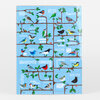 A colorful print with a grid of stylized birds perched on tree branches and repeated "air mail" text in multiple languages, including "LUFT POST," "AIR MAIL," "poste aerea," and "LUG POST."
