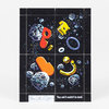 A black poster or print with four colored 3D-style letterforms and scattered planet-like dots, with the text "They said it couldn't be dumb." at the bottom.