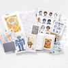 A boxed set of illustrated stamp sheets and a booklet, featuring multiple colorful artist-designed postage stamp panels with portraits, abstract patterns, and graphic figures.