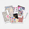 A set of multiple printed stamp sheets and booklet pages featuring assorted colorful illustrated designs, including leaves, vehicles, figures, abstract symbols, and repeated graphic patterns.