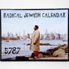 A calendar cover showing the text "RADICAL JEWISH CALENDAR" and "5787" above a person standing by the water with a city skyline in the background.