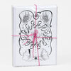 A stacked pack of blank greeting cards tied with pink string, featuring a black-and-white illustrated cover with hands holding seeds, swirling decorative shapes, two profile faces at the bottom, and small artist signatures.