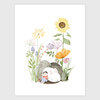 A watercolor-style art print shows a small child reading a red book while sitting beside a white rabbit among tall flowers and mushrooms.