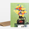 A greeting card shows a black coffee pot-style vase filled with yellow, red, and purple flowers, with the word "Bunn" visible on the pot.