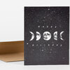 A black greeting card with a starry sky design shows the words "Happy Birthday" and a row of moon phase images across the center.