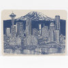 A rectangular card with rounded corners featuring a blue line illustration of the Seattle skyline, the Space Needle, the Public Market Center sign, a ferris wheel, ferries, and Mount Rainier, with the text "Seattle to Mt. Rainier" and "©2014 urban retrospectives" printed on it.