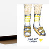 A folded greeting card with an illustrated pair of lower legs and sandals and the text "DAD FIT CHECK" with a small yellow heart.