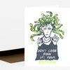 A folded birthday card with a Medusa illustration and the text "DON'T LOOK NOW IT'S YOUR BIRTHDAY" on the front.