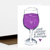 A greeting card with a hand-drawn wine glass filled with purple liquid and the text "POUR YOURSELF A HAPPY BIRTHDAY" plus a small purple heart.