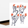 A folded greeting card with the front showing four illustrated rats and the orange hand-lettered text "CONGRATS RATS."