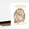A folded birthday greeting card featuring an illustrated furry creature and the text "CAN'T WAIT TO SEE YOU OPEN THOSE PRESENTS" and "HAPPY BIRTHDAY".