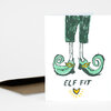 A folded greeting card with a cartoon illustration of green elf shoes and the text "ELF FIT" on the front.