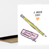 A white greeting card shows a yellow pencil with the words "you z", a pink eraser labeled "Love you."